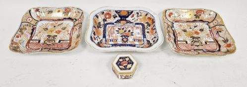 Three early 19th century English porcelain imari pattern shaped rectangular dishes, painted and gilt