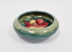 Moorcroft green ground Hibiscus pattern shallow bowl, printed and impressed marks, with overturned
