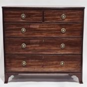 Early 19th-century mahogany chest of drawers, the caddy top with reeded edge over two short and