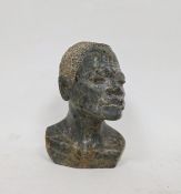 Nicholas Tandi (Zimbabwe born 1948), Shona carved stone bust of a man, with textured hair, signed to