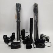 Collection of cameras and binoculars, including Canon A-1 camera, Yashica GS camera, Hoya skylight