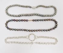 Tutti & Co selection of white pouches containing gold-plated costume jewellery including necklaces