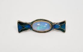 Continental white metal, opal and enamel Arts & Crafts style brooch, set oval cabochon opal and
