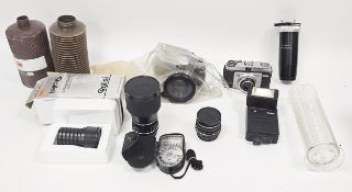 Collection of cameras and photography equipment, including Rolleiflex SL35 camera, Rollei flash,