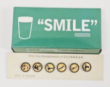 Set of six vintage Guinness crystal-style buttons mounted on their original card, each depicting a