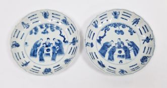 Pair of Chinese porcelain blue and white Five Scholars small circular dishes, each with six