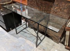 Contemporary console table, the glass top on a black metal tubular frame, 71cm high x 140cm wide x