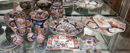 Group of Japanese imari porcelain, Meiji period, including: two lobed bowls and covers, two vases,