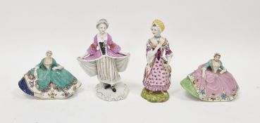 Group of 19th century Continental porcelain figures of ladies in fashionable dress, each in the 18th