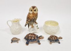 Karl Ens porcelain model of a tawny owl perched on a branch, together with a Belleek parian baluster