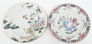 Two Chinese export plates, 18th century, the first painted in the famille rose pallette with a