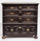 17th / early 18th-century oak chest of drawers, the rectangular top with thumb-moulded edge over a