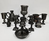 Irish pewter haystack measure with touchmarks, 20cm high, four pewter lidded tankards, pair of