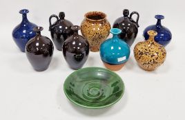 Three studio pottery vases by Russell Akerman, comprising an earthenware turquoise crackle glazed