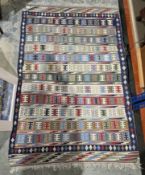 V Kilim rug with repeating geometric pattern rows, single geometric border flanked by single