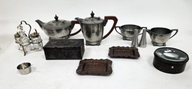 Art Deco hammered pewter four-piece tea service comprising teapot, hot water pot, milk and sugar