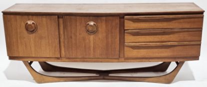 V Mid-century teak sideboard by Beautility, of bow-fronted form, a central drop-front cocktail