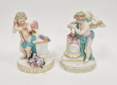Pair of Meissen (outside-decorated) figures of Cupid, circa 1880, blue crossed swords and