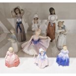 Group of Lladro figures including: a girl with lamb, a girl standing with wide brimmed hat,