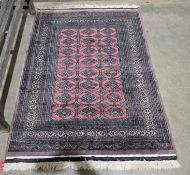 V Eastern salmon ground rug with three rows of eight lozenges on a lozenge-shaped grid, multiple