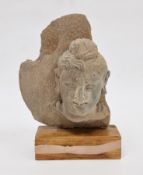 Carved stone Bodhisattva head fragment, possibly Gandhara region & 4th Century, the hair with