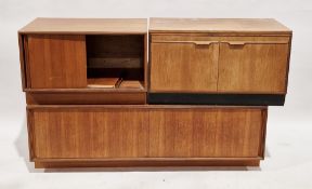 Two mid-century G-Plan teak low cabinets, both with solid doors and on plinth bases (smaller cabinet