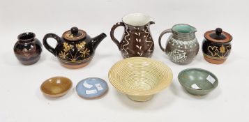 Studio pottery slipware jug, indistinct incised signature to base, trailed with pale blue stylised
