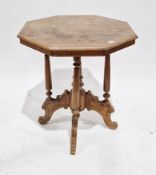 Arts and Crafts walnut side table, the octagonal top with thumb-moulded edge, on four turned tapered