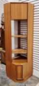 Mid-century G-Plan teak corner unit, the upper section comprising a cupboard door above two shelves,