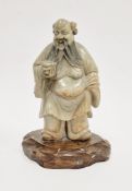 Chinese carved soapstone figure of Shouxing, Qing Dynasty, standing, with black stained pigment to
