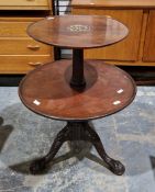 19th-century mahogany graduated two-tier whatnot of circular form, on fluted tapered column and