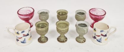 Six Stratford-on-Avon studio pottery footed goblets, impressed marks, in grey and grey-green glazes;