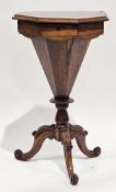 Victorian rosewood trumpet sewing or work table of octagonal form, the hinged lid opening to an