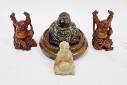 Collection of Chinese carved wood and hardstone figures of buddhas, 20th century, comprising: a pair