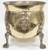 Brass log bucket of cauldron form, with lion's mask drop ring handles and lion paw feet, 37cm high x