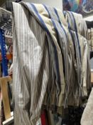 Approximately 5 pairs of lined curtains, one pair with a blue striped fabric, three pairs with a