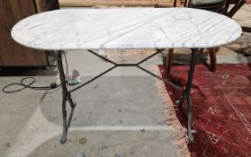Marble topped garden or conservatory table on a wrought iron base, 72cm high x 119cm long