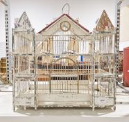 Distressed white painted wooden bird cage of architectural form, 50cm high