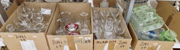 Collection of glassware, including drinking glasses, jugs, decanters, bowls, part green glass
