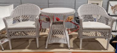 Rattan effect garden or conservatory circular table and two tub chairs from the Blue Diamond