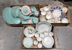 Early 20th century bone china part tea service, decorated with flowers on a pale green ground, the