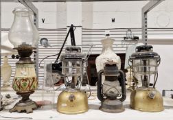 V Victorian brass oil lamp with glazed pottery well with clear glass shade and chimney, together