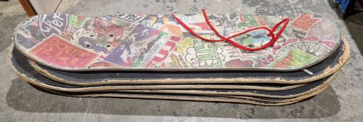 Six double kicktail skateboard decks with different designs to undersides, each 82cm long