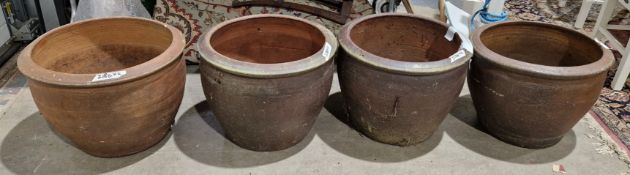 Set of three brown glazed garden planters 50 x 38cm, with another similar (4)
