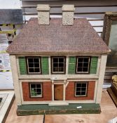 Early to mid-20th century wooden painted doll's house with hinged opening front, 76cm high x 64cm