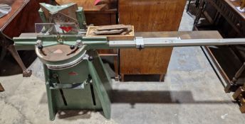 Morso mitre guillotine on cast iron green metal stand together with an attached measuring