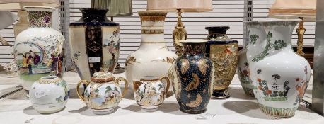 Collection of eight Oriental ceramic vases, largest 31cm high together with a Japanese lidded
