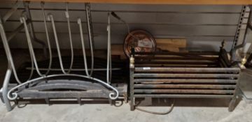 Cast iron fire grate with brass finials, 39cm high x 61cm wide together with a wrought iron log/
