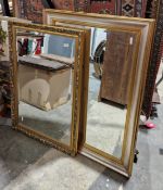 Two modern gilt-framed mirrors, the plates with bevelled edges, largest 109cm x 77cm