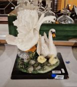 Academy resin sculpture of two swans with cygnets, 29cm high